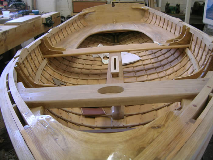 Students at the Boat Building Academy race to complete boat building 